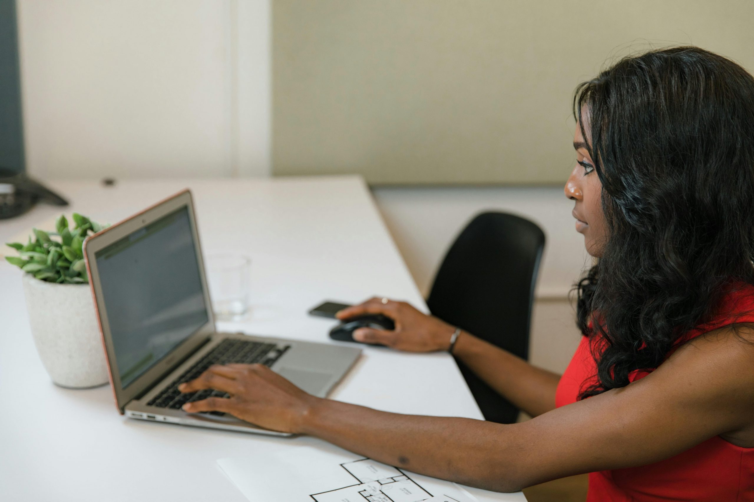 Executive Virtual Assistant working on laptop
